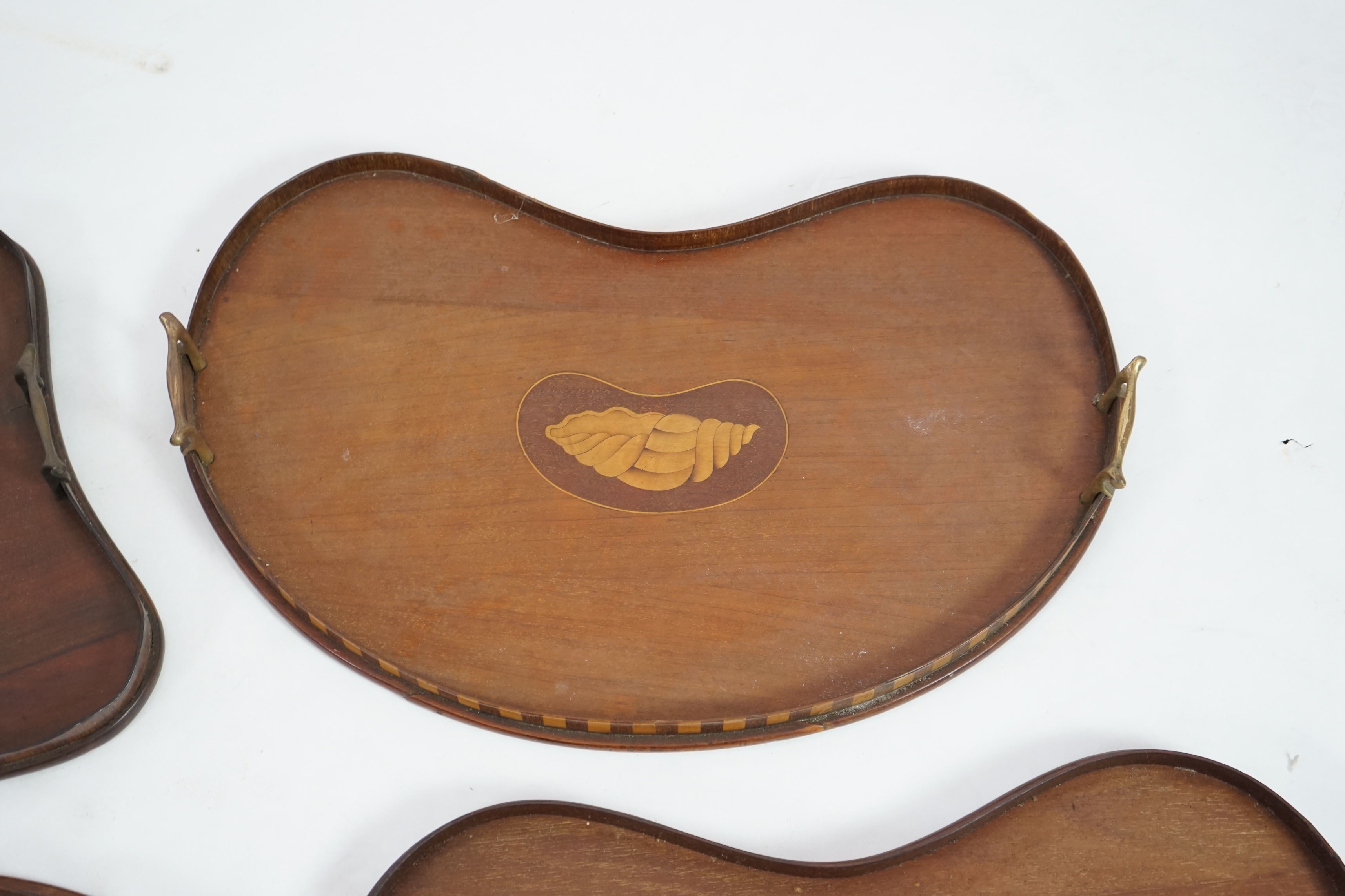 Four Edwardian inlaid mahogany gallery trays